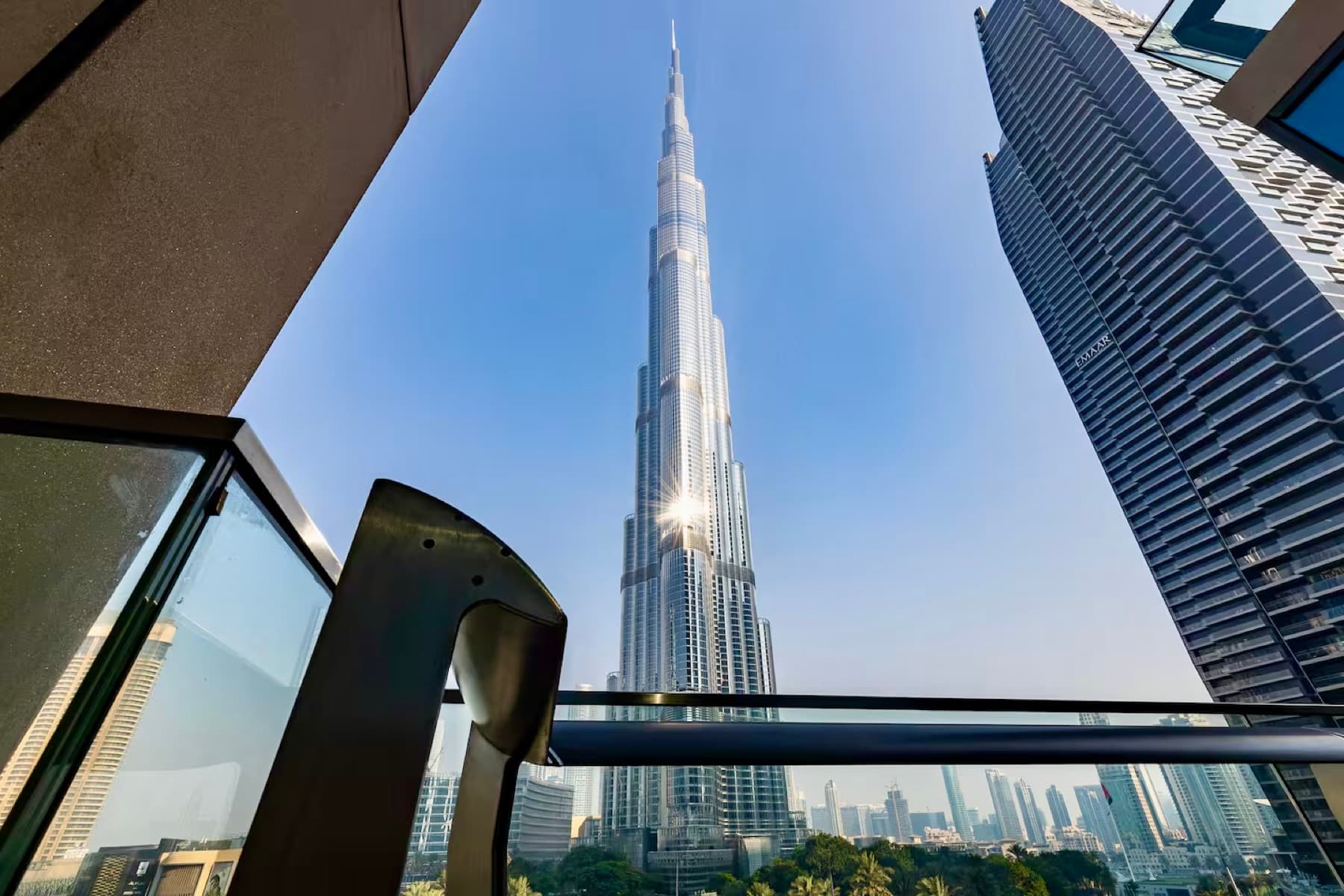 Burj Vista balcony with seating and Downtown Dubai backdrop